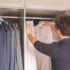 Tough Hook heavy-duty hanger holding a winter coat in a closet