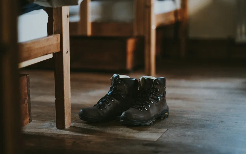Dry Faster, Smell Less: Better Hanging for Damp or Sweaty Gear | Heavy Duty Hangers by Tough Hook Pair of damp hiking boots set out to air dry after a wet hike
